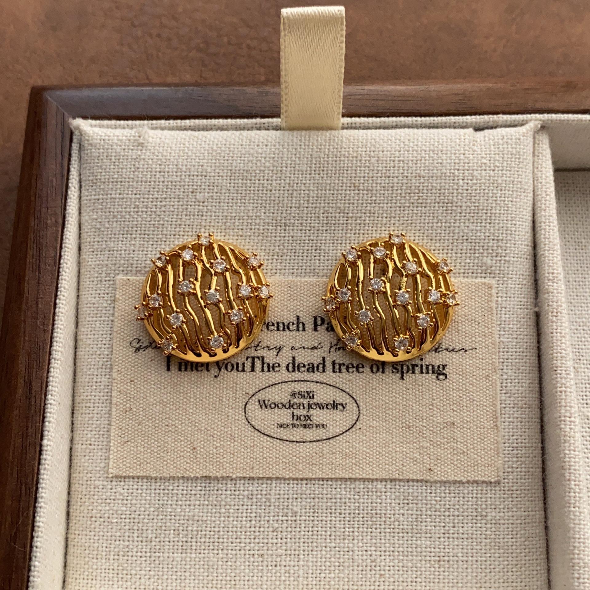 Hollow round stud earrings smooth polished zircon wave temperament unique earrings