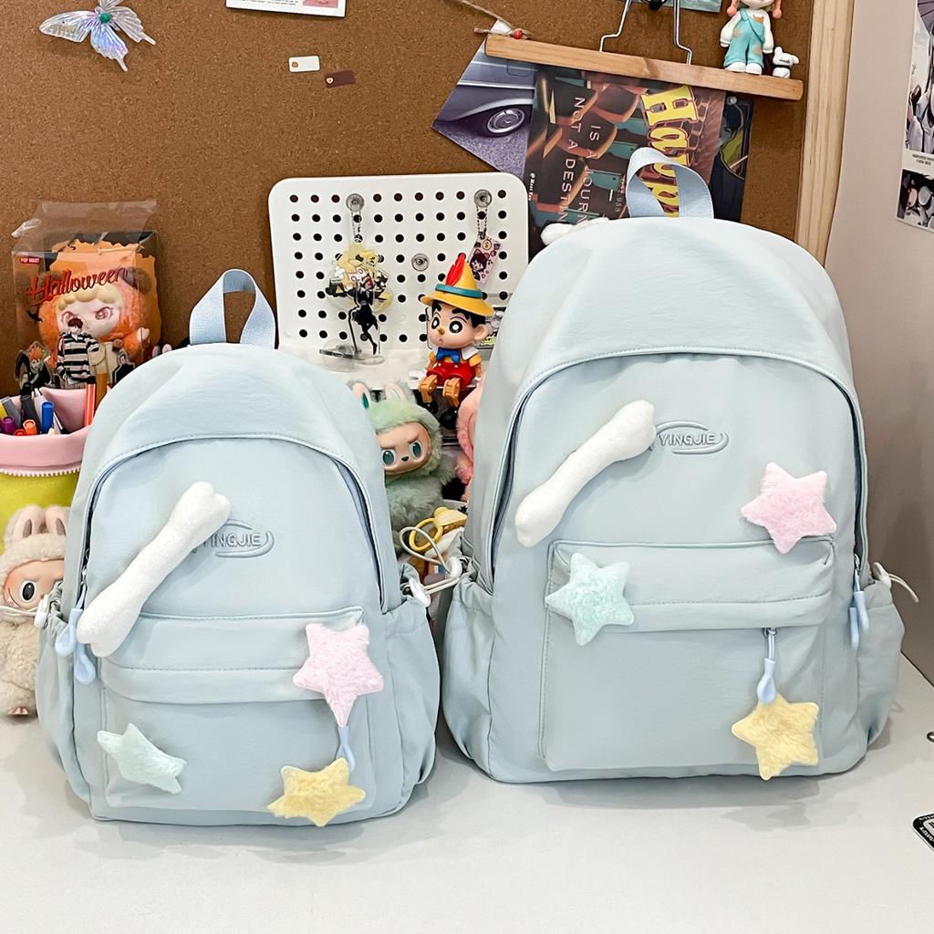 Solid color simple casual backpack female niche design sense lightweight size backpack class primary and secondary school students schoolbag