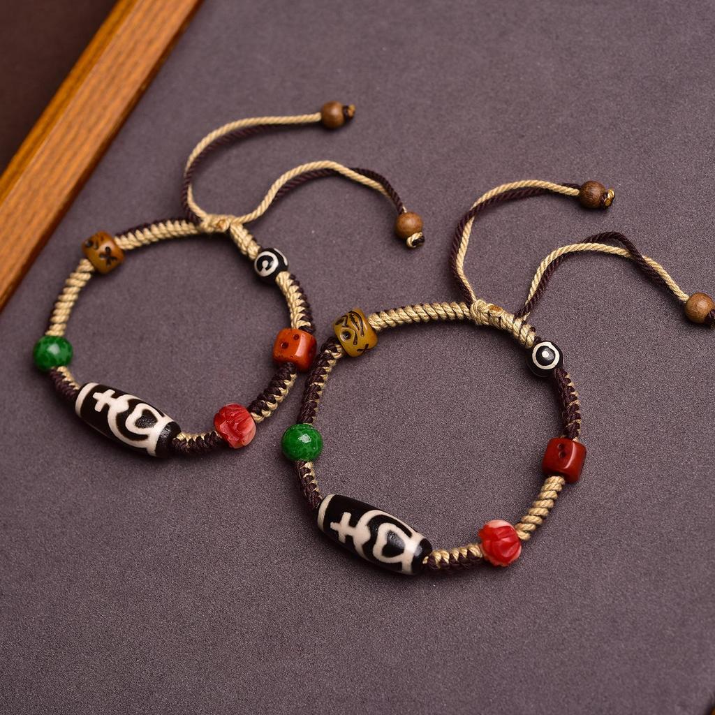 Adjustable Tibetan Handcrafted Dzi Bead Bracelet with Auspicious Hand-Rubbed Cotton Cord