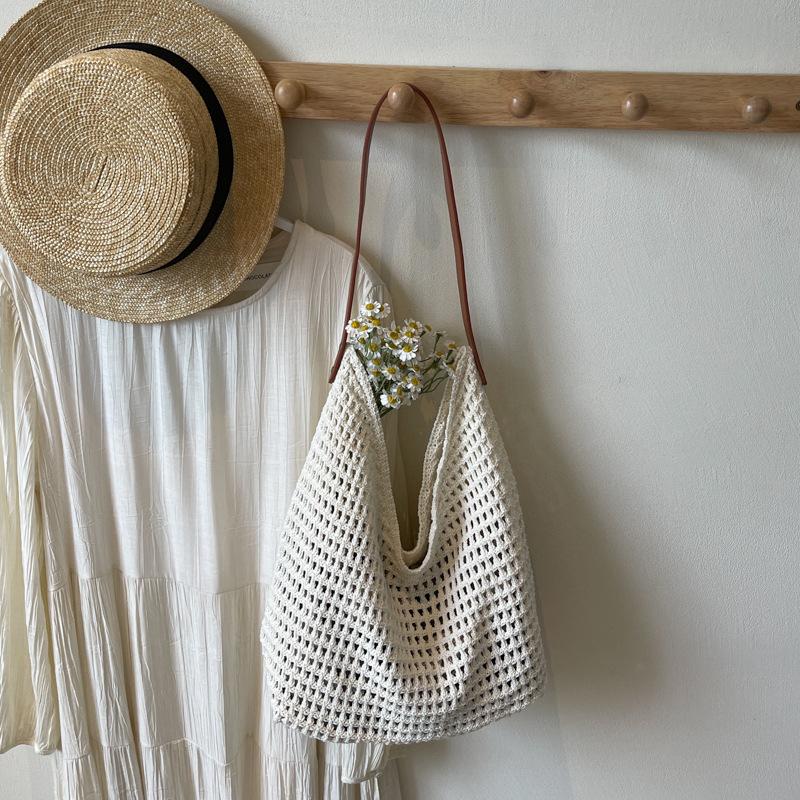 Lazy wind tote bag women's new niche high-end woven bag seaside vacation shoulder bag