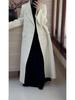 Urban Silhouette: Women's Double-Breasted Wool Coat with Suit Collar, Korean Style Slimming Design for Fall/Winter.