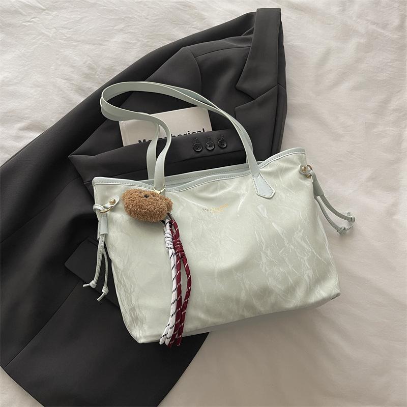 Shoulder bag to work commuter women's bag 2025 autumn new fashion niche casual simple retro hand carry tote bag women