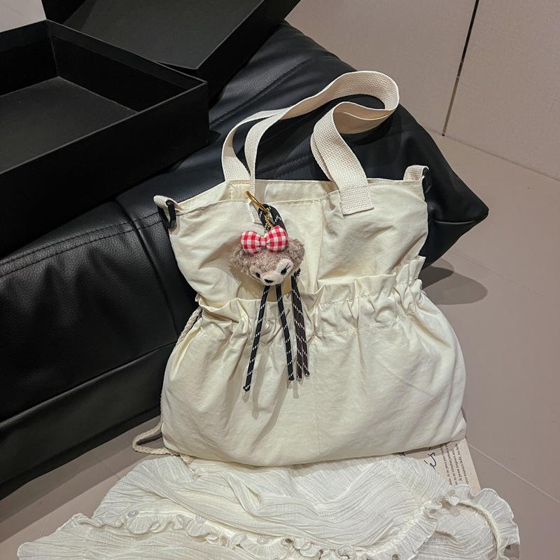 

2025 новая японская сумка большой вместимости в литературном и художественном стиле, легкая и простая, повседневная модная сумка-тоут, студенческая сумка через плечо Without pendant