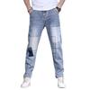 Pantaloni da uomo Patchwork Splicing Denim Primavera e Autunno Piedi Piccoli Tendenza Hip-hop Casual Versatili Taglie Forti