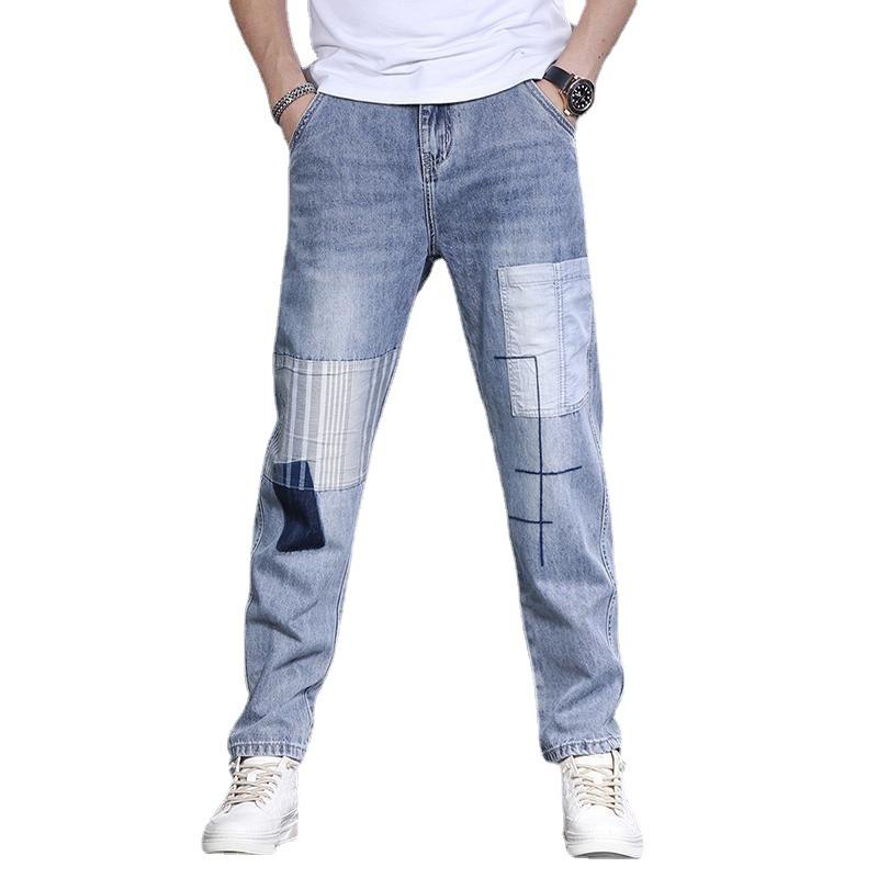 Pantaloni da uomo Patchwork Splicing Denim Primavera e Autunno Piedi Piccoli Tendenza Hip-hop Casual Versatili Taglie Forti