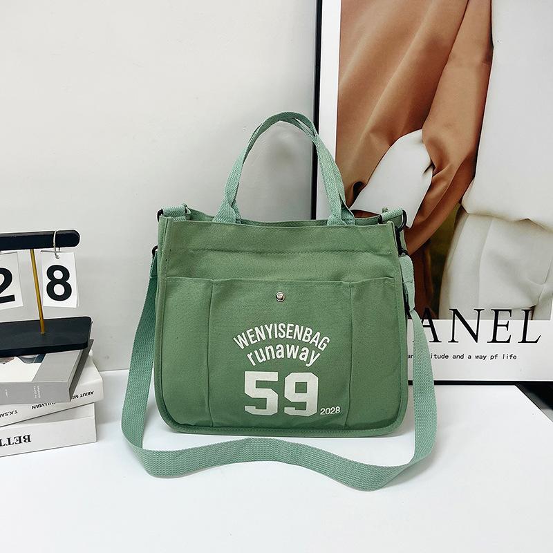 

Sports and leisure letter tote bag 2024 autumn new large-capacity Korean version simple high-value shoulder bag зелений