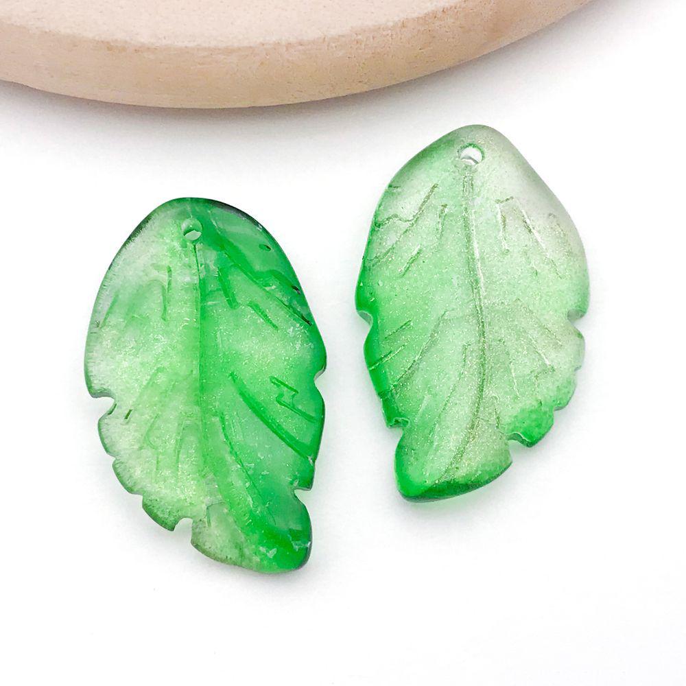 Set of 20 Green Transparent Faux Glass Leaf Pendants for DIY Bracelets, Necklaces, and Video Accessories.