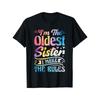 Humorous T-Shirt for The Eldest Sister - Comfortable Fit for Any Season, Black with Vibrant Geometric Text and Heart Designs