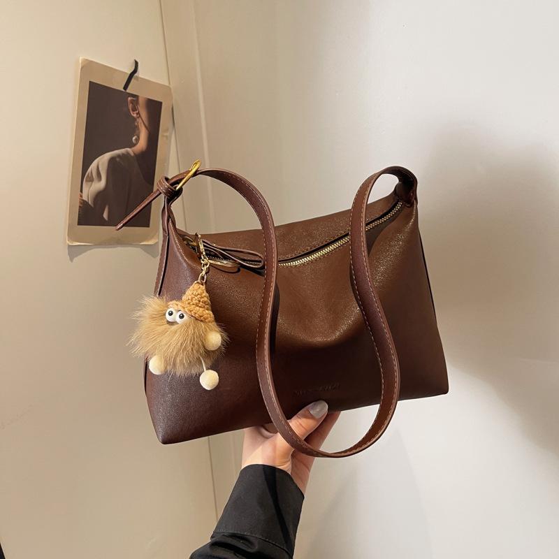 

Жіноча сумка-месенджер великої місткості, нова осінь-зима 2024 року, елітна універсальна повсякденна сумка через плече для приміських поїздок. темно-коричневого кольору