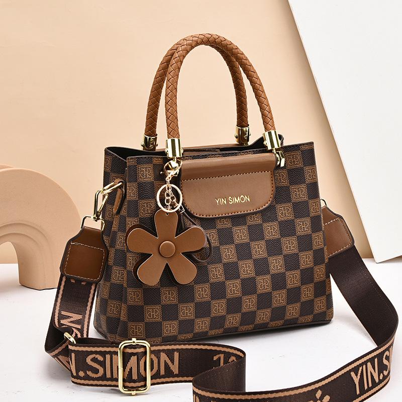 Hinkväska dam 2025 ny höst- och vintermode axelväska sned axelväska blomväska handväska med stor kapacitet damväska tide