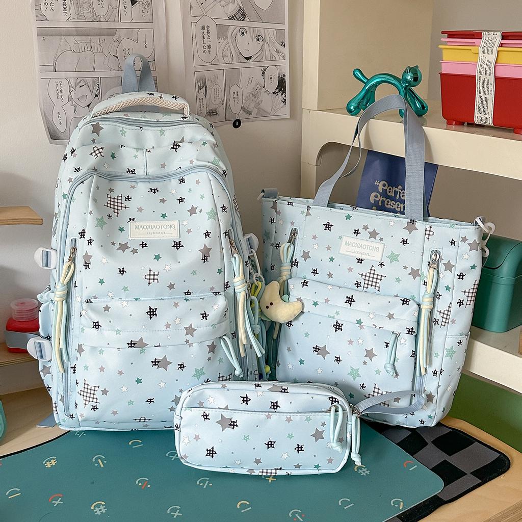Schoolbag small fresh student schoolbag female ins cartoon star printing junior high school student large capacity backpack burden reduction spine bag