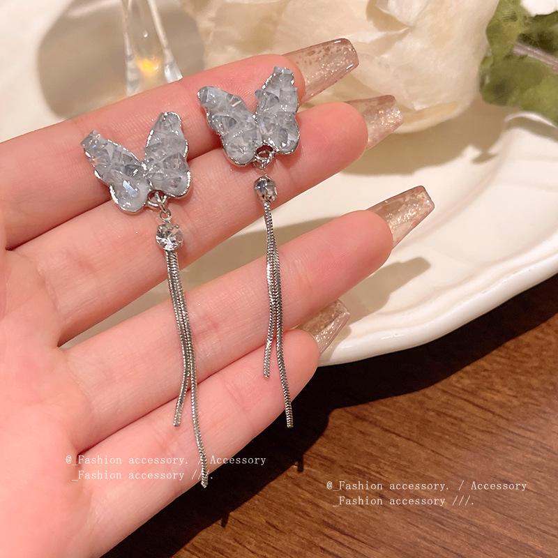 

Sterling Silver Blue Crystal & Diamond Flower Tassel Earrings with Butterfly Design