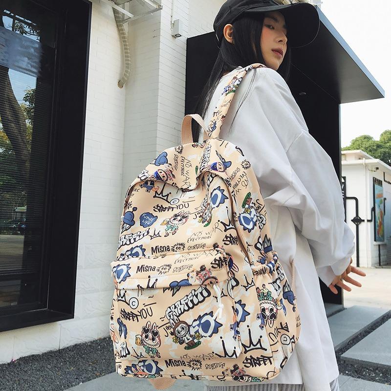 New backpack male junior high school student schoolbag fashionable new female backpack travel backpack