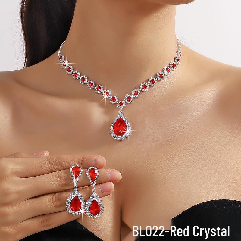 

White Teardrop Crystal Necklace & Earrings Set with Blue-Green and Red Accents
