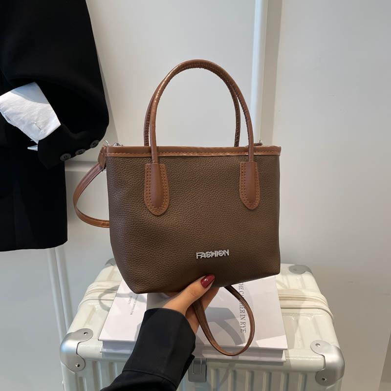 

Niche fashion bag women s high-value new versatile shoulder messenger bag commuting daily vegetable basket women s bag