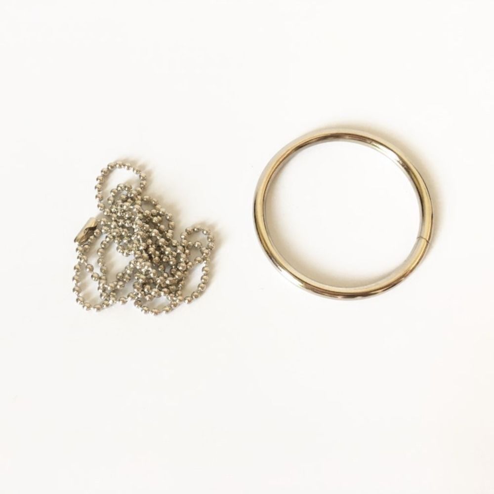 Metall Stahl Zauberring und Kette Nahaufnahme Illusion Requisit Metallknotenring an Kette Erwachsene