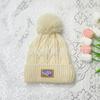 Winter plush wool hat women's warm thickened winter white knitted hat women's fashion versatile double-layer ear protection hat