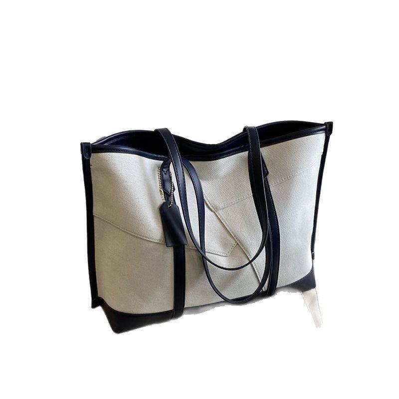 Denim-Tasche Damen 2025 neue kontrastfarbene Patchwork-Mode-Umhängetasche High-End-Pendler-Tragetasche
