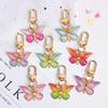 Gradient Butterfly Pendant: Iridescent Keychain Charm for Backpack or Earphone Case.