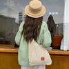 Seaside vacation beach bag weaving 2025 new fashion versatile hollow knitted bag large capacity shoulder armpit bag
