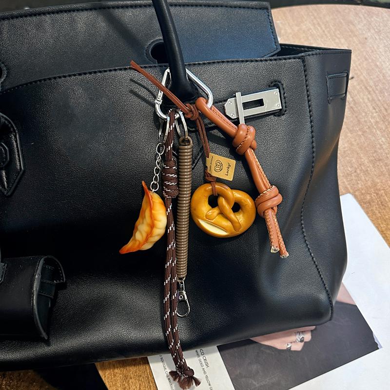 Yogodlns Cute Smiling Face Bread Woven Rope Dumpling Pendant Bag Accessory Handmade Trendy Bag Hanging Alkali Water Bread Bagel Bag Pendant