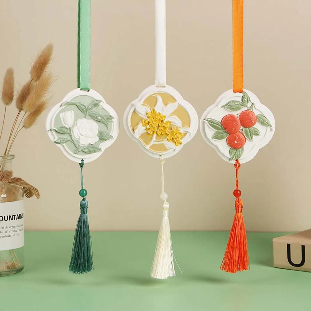

Air freshener perfume pendant on the car, gypsum hanging decorations, osmanthus, gardenia, orange fragrance tablets мандариновий