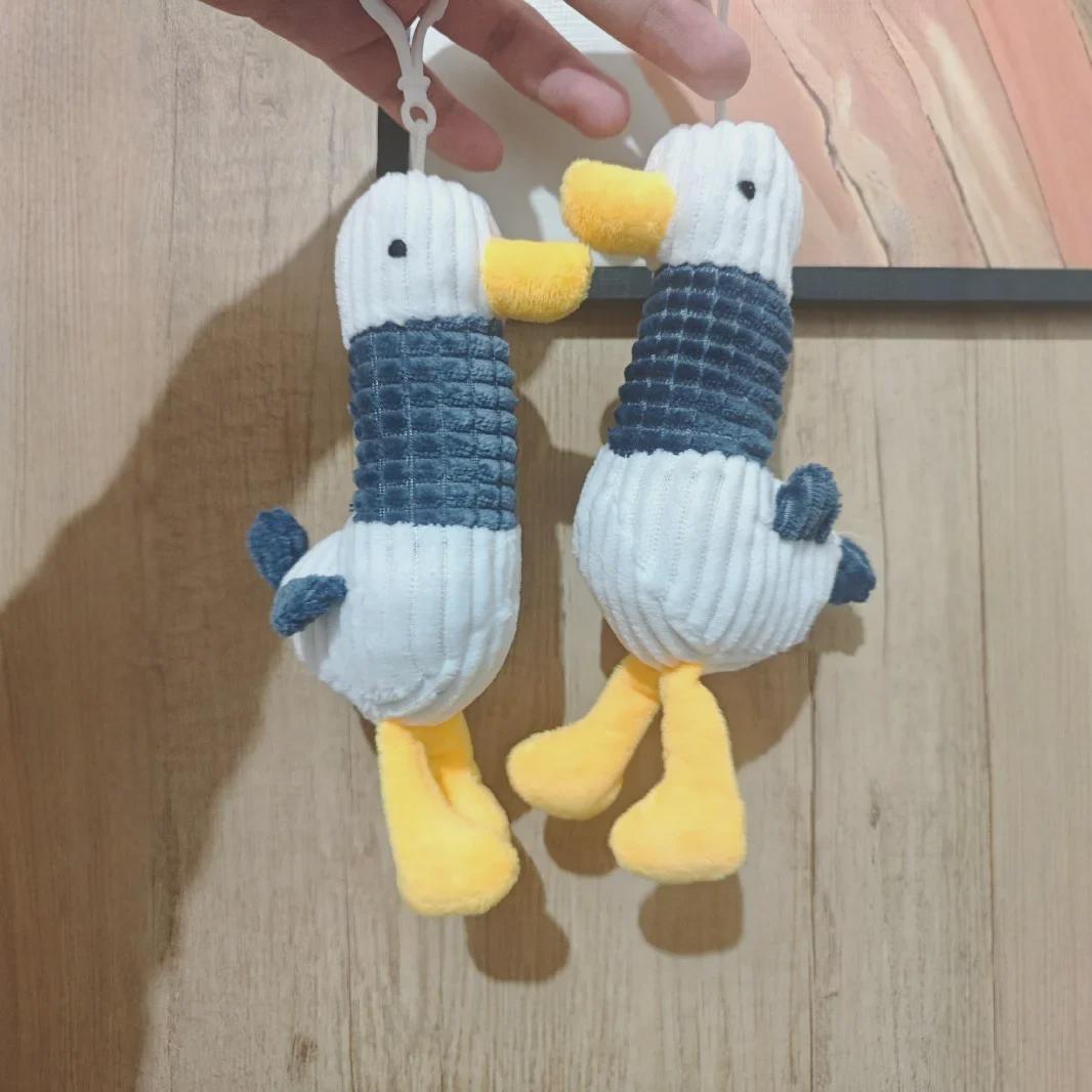 

Милый плюшевый брелок в виде ликующей утки - небольшой подарочный кулон