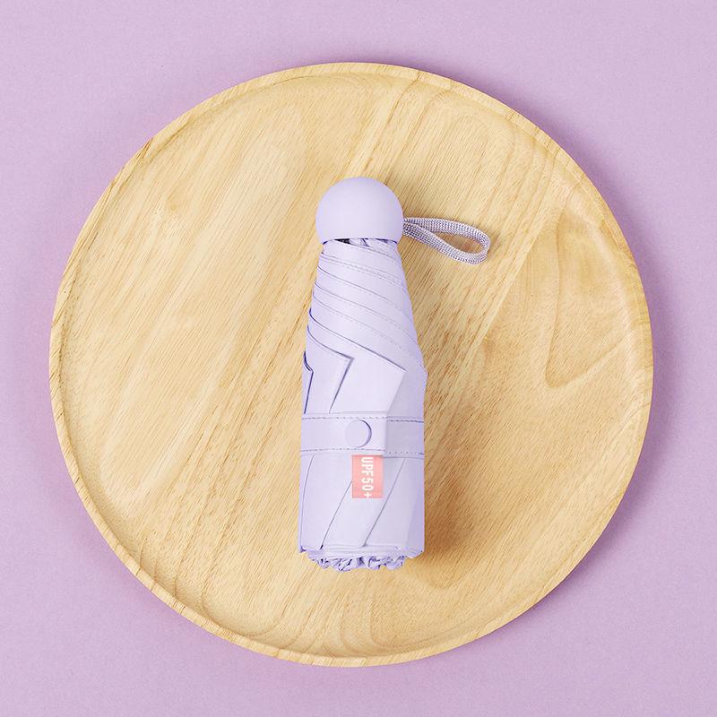 Parasol Capsule Sun Umbrella: 50% Off Mini UV Protection for Women, Dual-Purpose for Sun and Rain.
