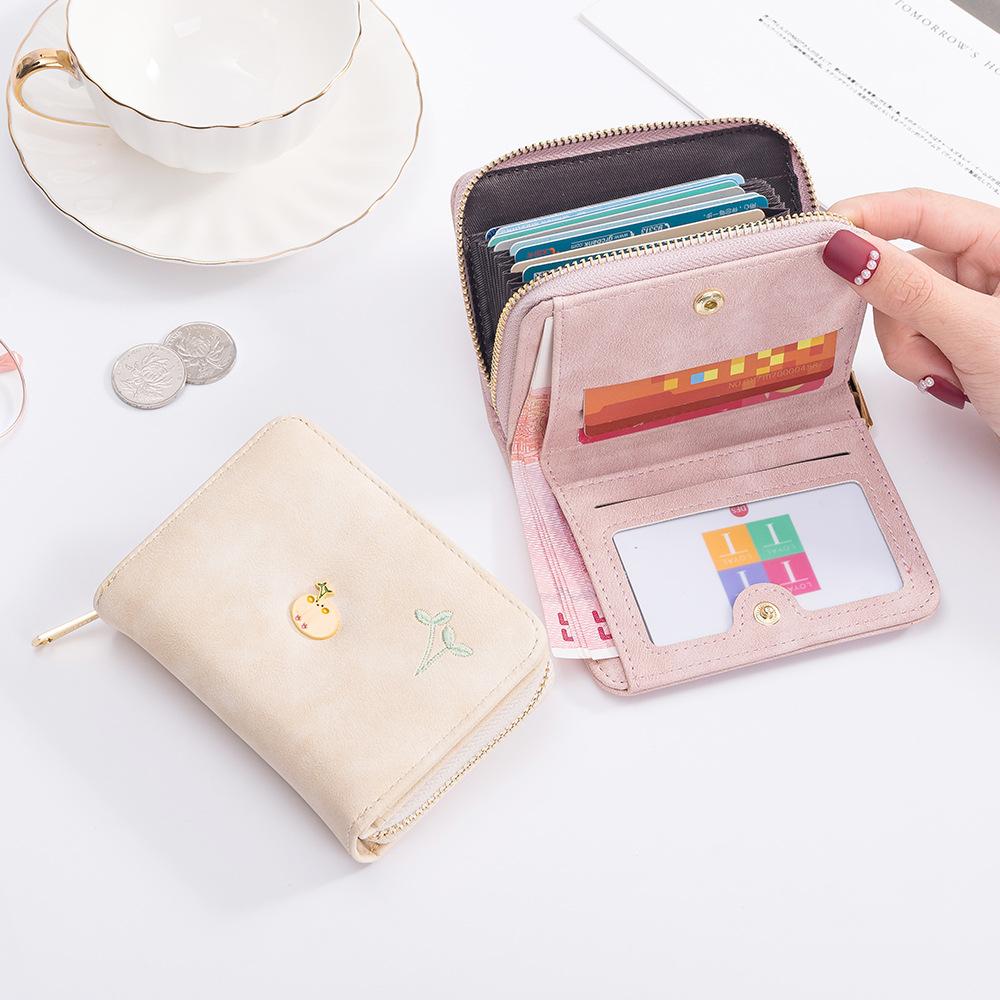 Wallet women's short card bag integrated bag new Korean version fashionable cute small fresh student folding zipper change bag