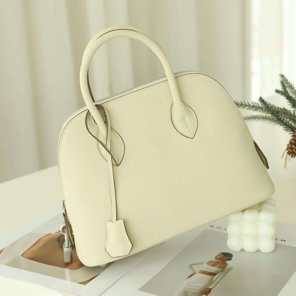 Classic Cowhide Bowling Handbag 2025 - Simple, Versatile Shell Messenger Bag