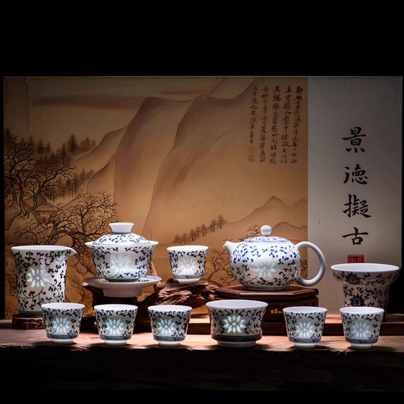 Exquisite mutton fat jade white porcelain gift blue and white lotus teapot, teacup, gaiwan set, full set of kung fu tea sets for home use