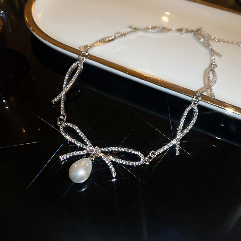 Korean Sweet Rhinestone Bow & Pearl Necklace: Elegant, High-End Clavicle Chain for Women