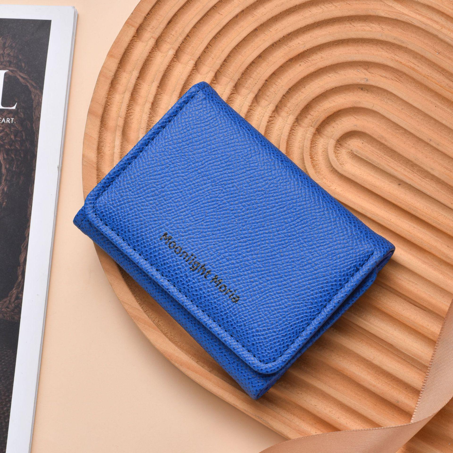 

Unisex Ultra-thin Tri-fold Wallet: Simple Korean Style Leather Money Clip with Multi-card Slots for Students and Youth 10.6x8x2cm синій