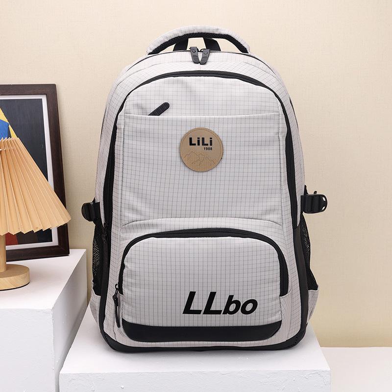 

Extra-Large Travel Backpack for Men, Women, High School & College Students - Spacious & Stylish Computer Bag світло-сірий колір