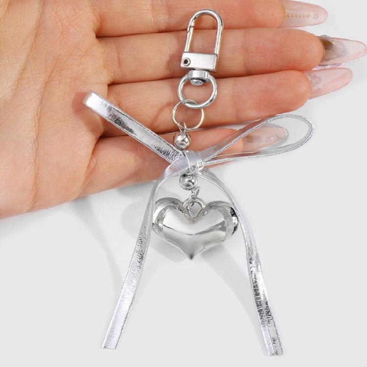 Heart Embellished Silver Leather Bowknot Key Rings Unique Accessory for Backpacks and Purses for the Modern Woman
