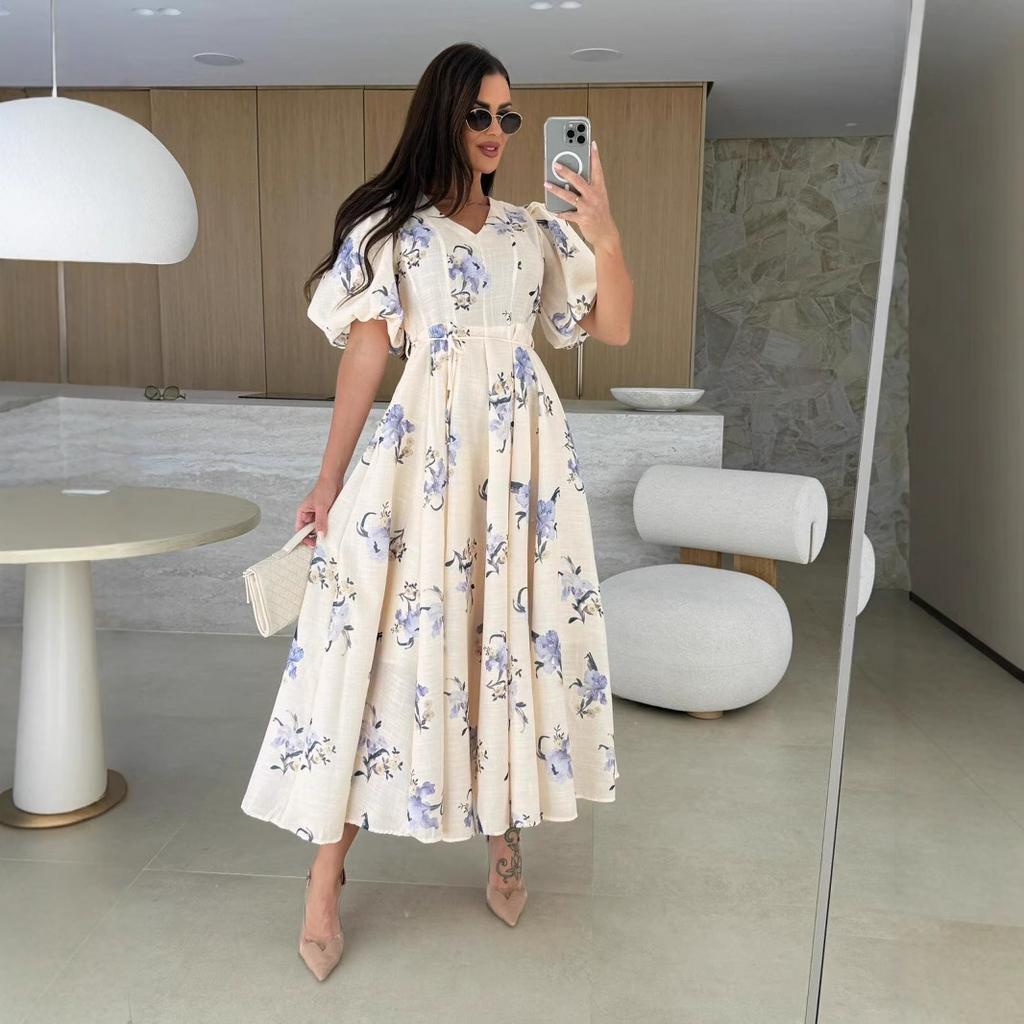 A New Summer Women's Dress with A V-neck, Puffed Sleeves, Printed Ties and A Large Swing