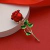 [Holiday Joy] Elegant Red Rose Brooch with Green Leaves - Stylish Alloy Lapel Pin, Perfect for Dresses, Sweaters, and Coats - Th