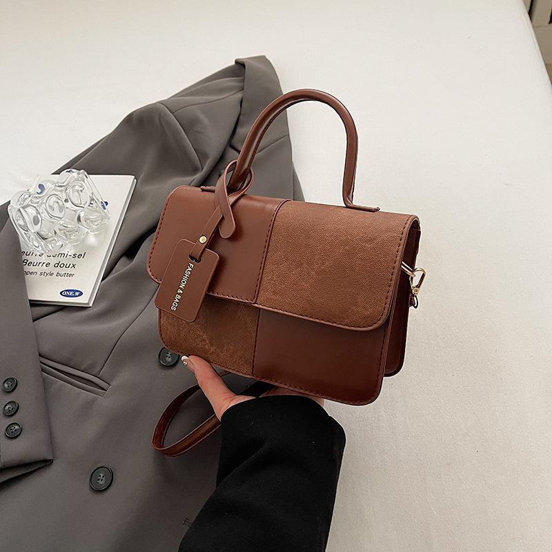Winter new niche design contrasting color splicing portable small square bag fashionable simple retro shoulder bag