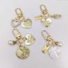 Creative Alloy Seashell Heart Pearl Keychain – Cute Heart Bag Charm Conch Jewelry Keyring