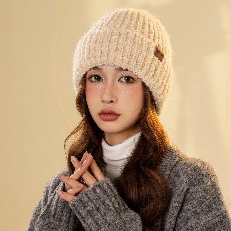 Small leather label dot knitted warm hat women's winter pullover ear protection cycling hat outdoor knitted straight hat