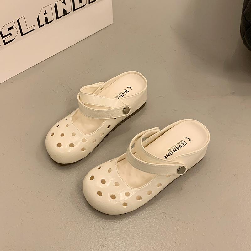 

Internet celebrity black inner heightening bag head flat bottom hole slippers women s summer wear 2025 new retro Birkencool slippers 35