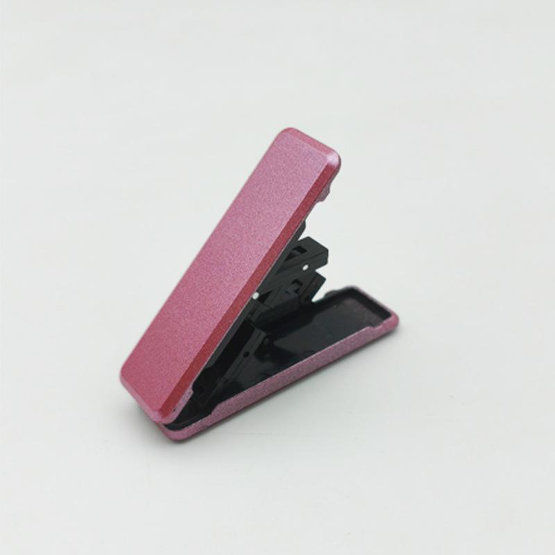 Compact Foldable Phone Holder: Mini Stick-On Stand for Desktops