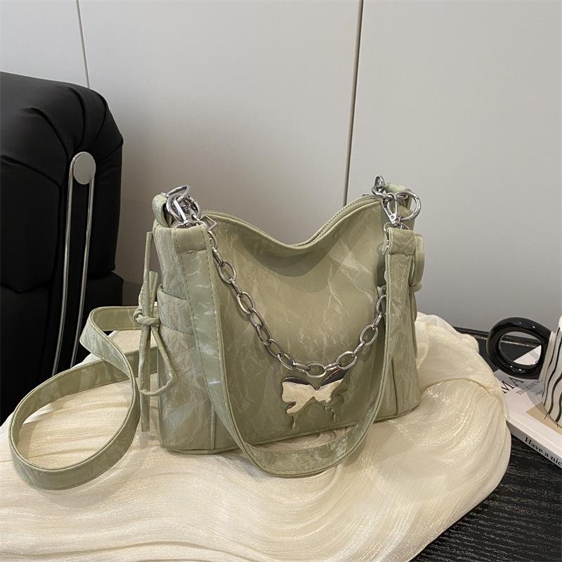 Korean version of fashion butterfly chain messenger bag women's 2025 summer new versatile hand carry shoulder armpit bag tide