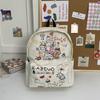 Die neue Schultasche ist ein hochwertiger, frischer, süßer und niedlicher Cartoon-Rucksack, ein leichter Rucksack für den Frühlingsausflug für Schüler der Sekundarstufe I