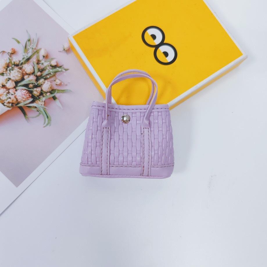 

New woven pattern garden bag mini vegetable basket change bag contrasting color mini car pendant small handbag hanging фиолетовый
