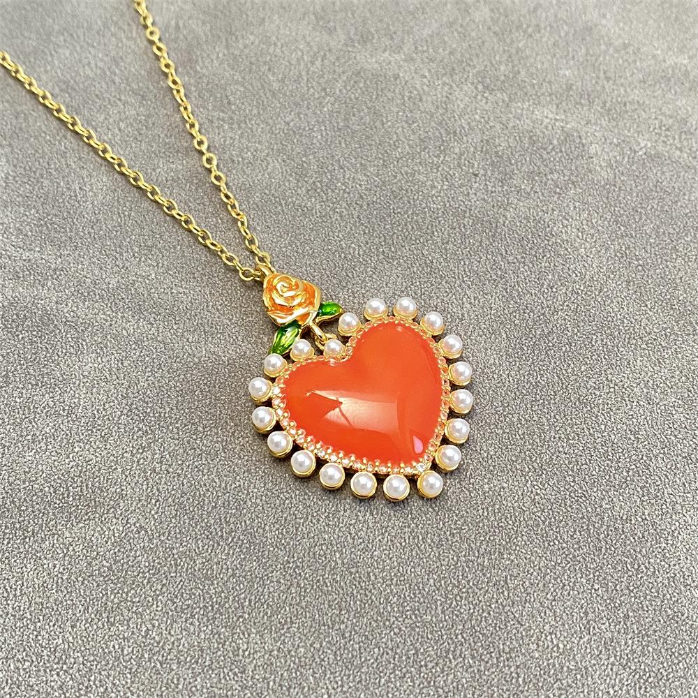 

Elegant Pink Rose Heart Pearl Necklace with Peach Heart Pendant