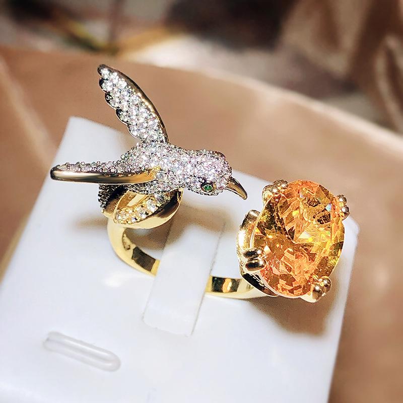 High-End Hummingbird Ring: Santa Maria Aquamarine-Look with Colored Gemstones for Women