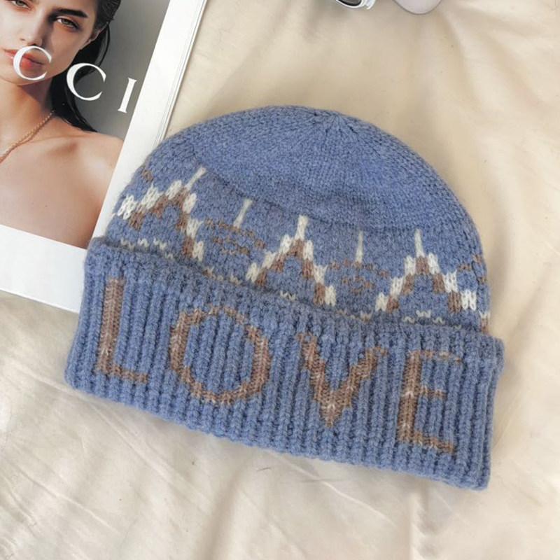 Fair Island style letter jacquard hat women's autumn and winter new warm knitted hat big head circumference wool hat headgear
