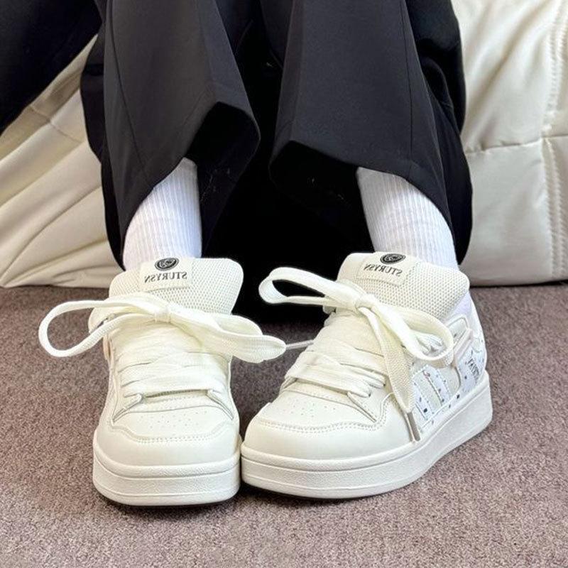 Vielseitige Plattform Casual Sport Board Schuhe Frühling neu Nische originell beige bedruckte Brotschuhe