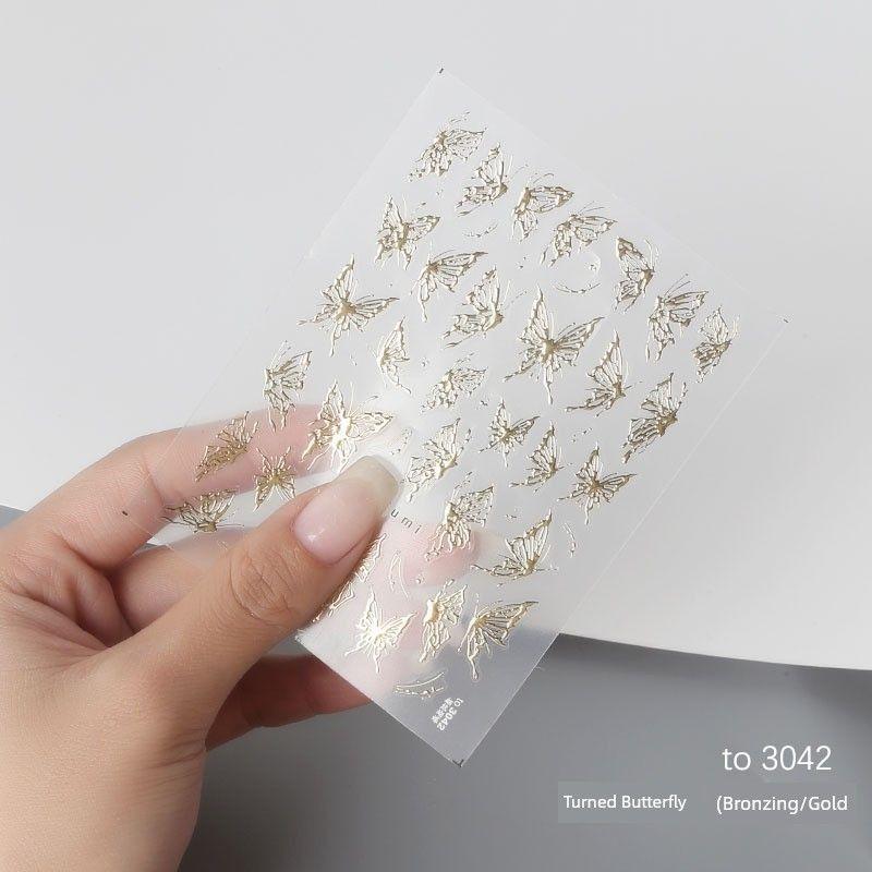 

Manicure Sticker Ornament 7 Color Laser Elegant Butterfly Stickers Bronzing 5D Colorful Relief Laser Nail Sticker Pieces of Flowers Butterfly (to 3042 Gold)